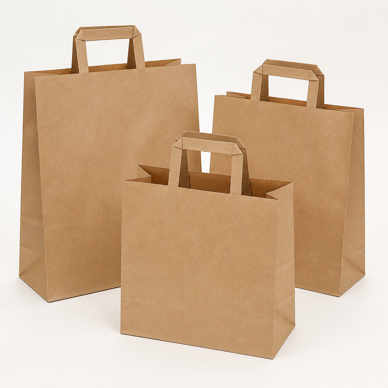 Brown kraft paper carrier bags with flat handles