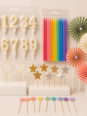 Assorted numeral and slim candles with plain birthday cake toppers