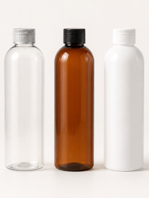 Slim bullet-shaped clear amber and white cosmetic bottles