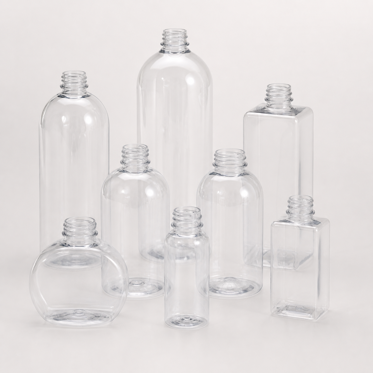 Uncapped clear PET bottles with threaded necks
