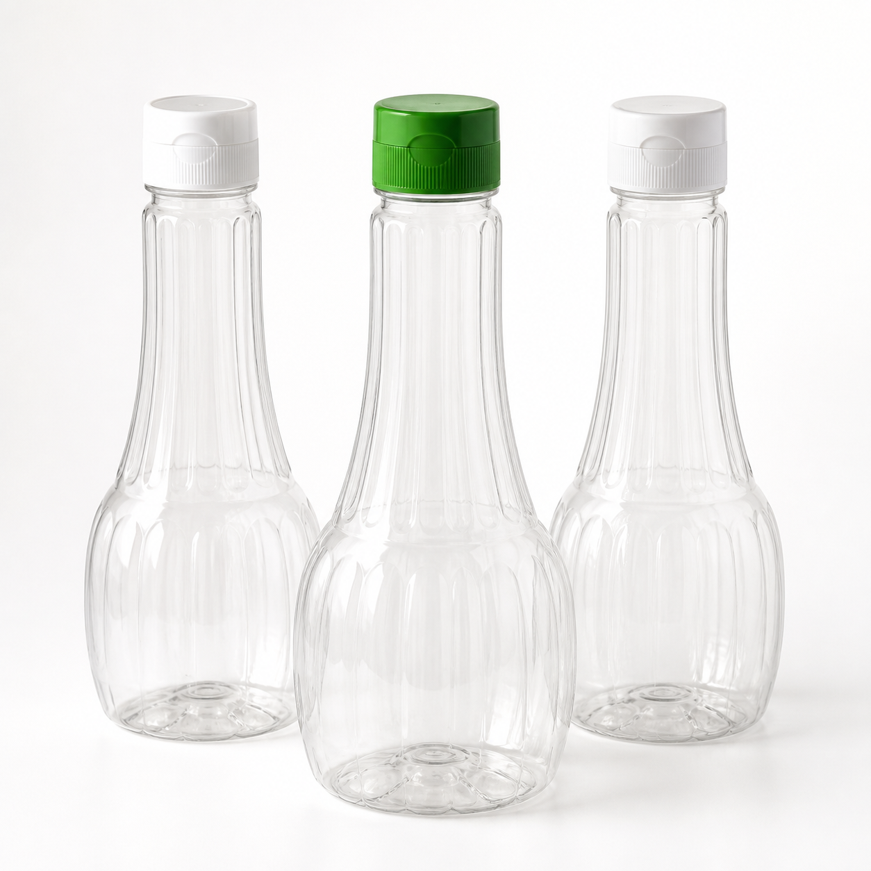Clear ribbed PET salad dressing bottles with flip-top caps
