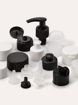 Assorted bottle closures including screw caps flip tops spouts and pumps