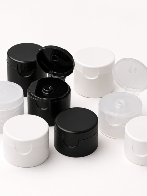 Plastic disc-top dispensing caps shown open and closed