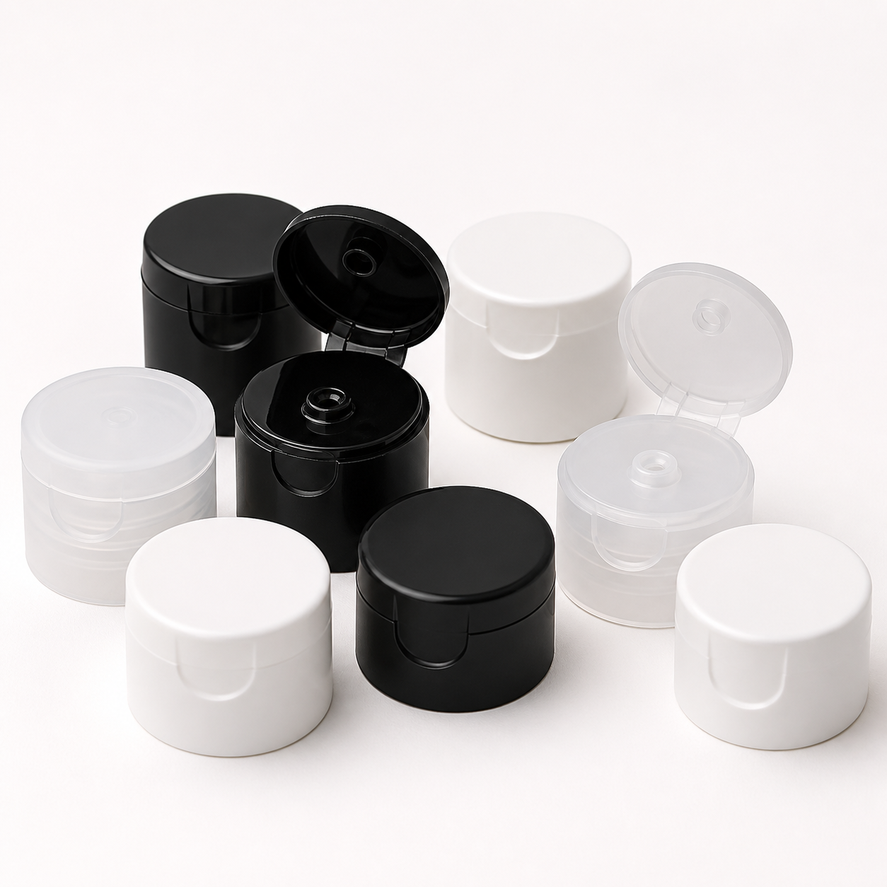 Plastic disc-top dispensing caps shown open and closed