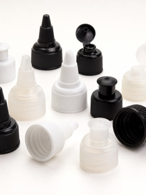 Pointed and pull-up plastic dispensing spout closures