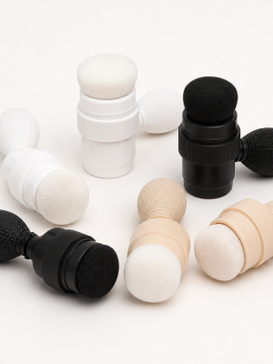 Cosmetic powder puffer applicator closures with squeeze bulbs and soft tips