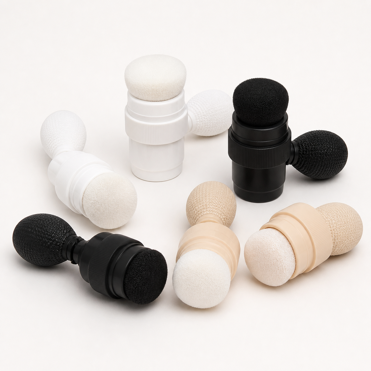 Cosmetic powder puffer applicator closures with squeeze bulbs and soft tips