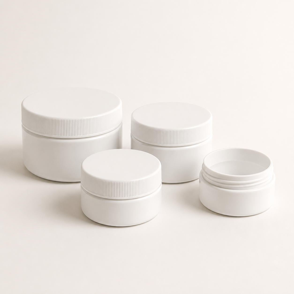 Empty white polypropylene cosmetic ointment jars with ribbed screw lids