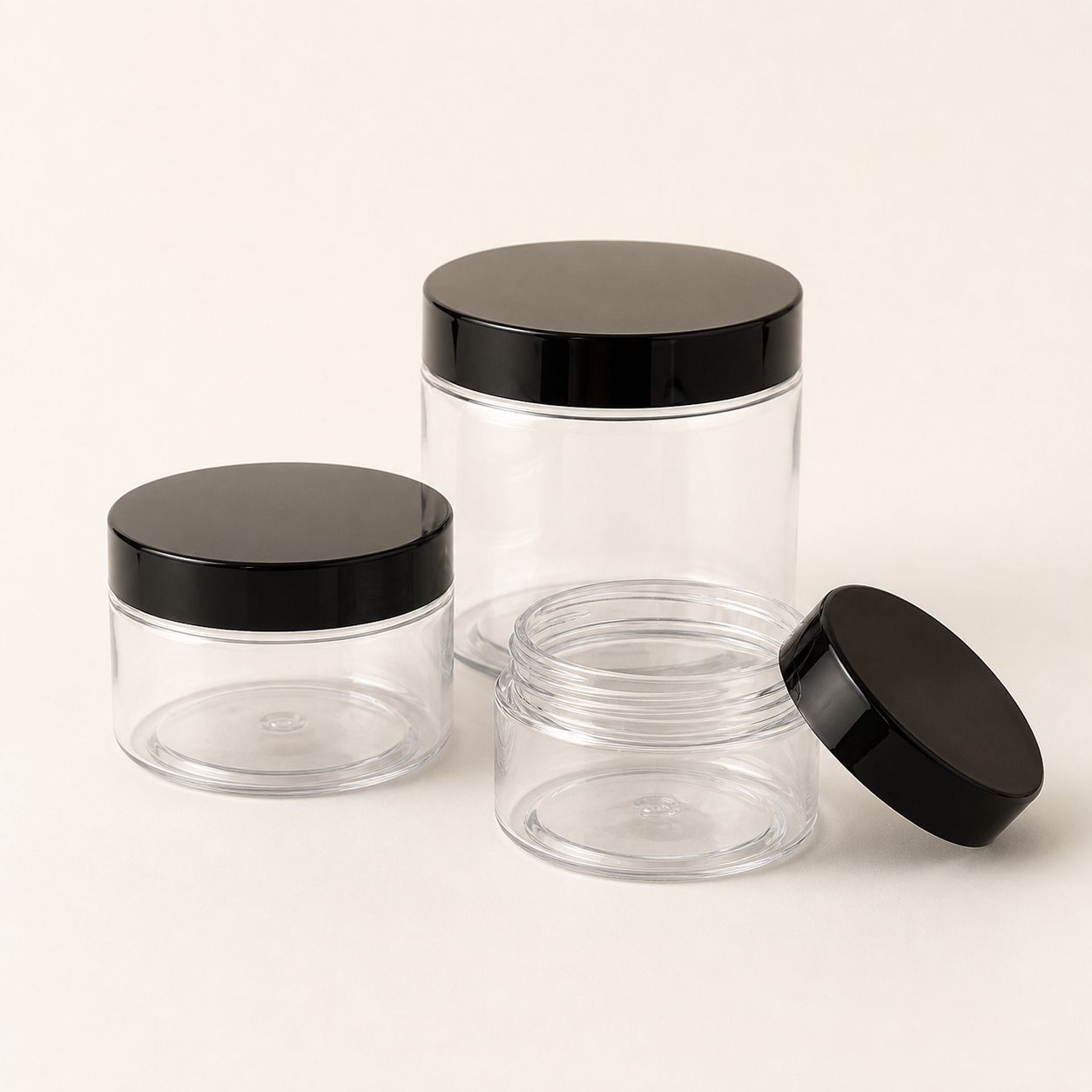 Clear lightweight PET cosmetic jars with black screw lids