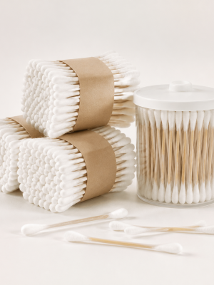 Plain white cotton earbuds in bundles and clear dispenser
