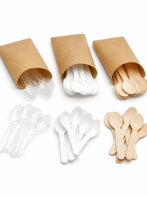 Small disposable clear white and birchwood teaspoons