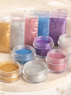 Fine food-safe edible glitter powders in assorted metallic and pearl colours