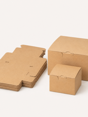 Flat-packed kraft folding box blanks with assembled self-locking boxes