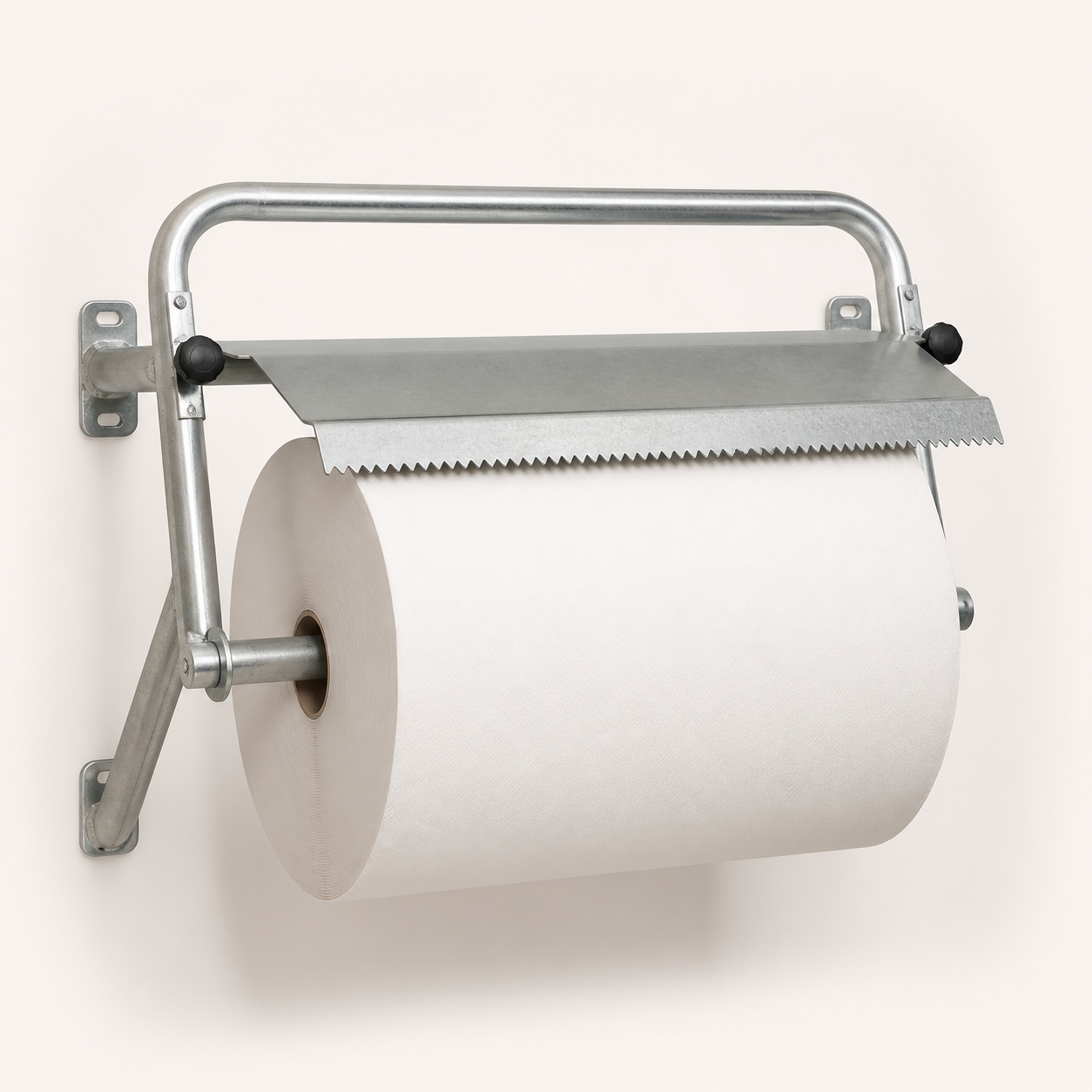 Wall-mounted galvanised steel Impi paper roll dispenser with serrated tear edge