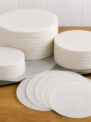 Round waxed food-grade separator paper discs in assorted diameters