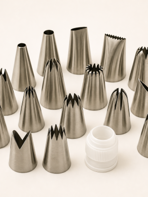 Assorted stainless steel cake decorating piping nozzles and coupler