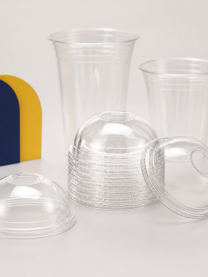 Clear compostable PLA dome lids with straw holes