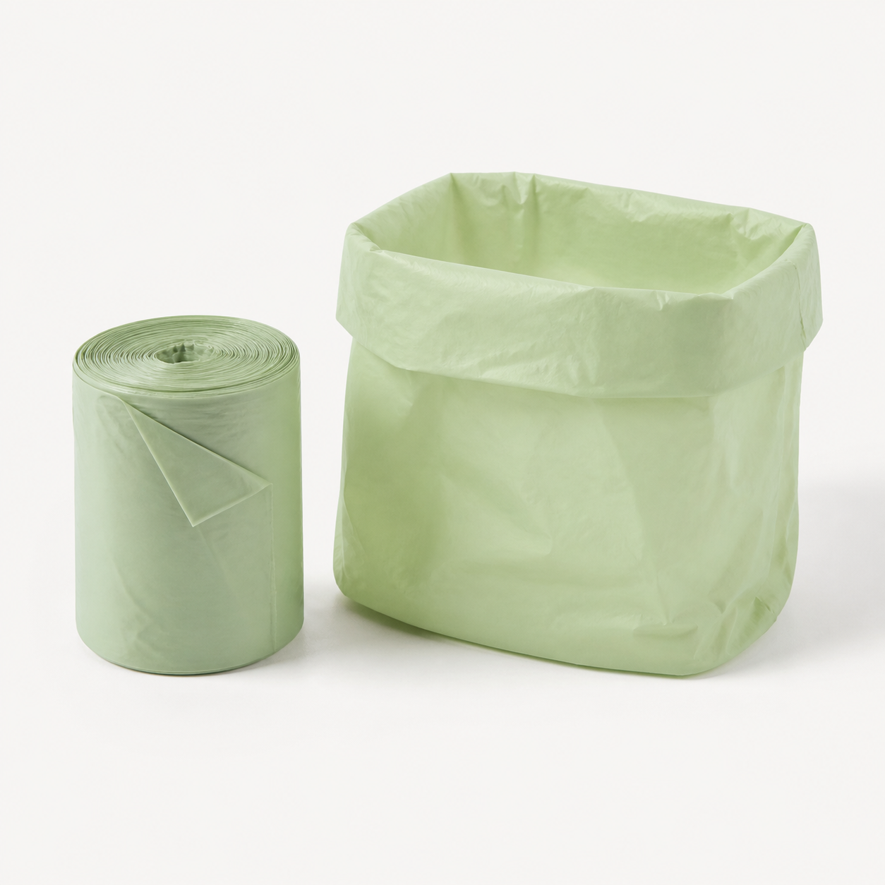 Small pale green home-compostable kitchen caddy liners